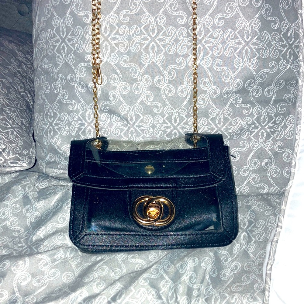 Clear black and gold purse🖤⭐️